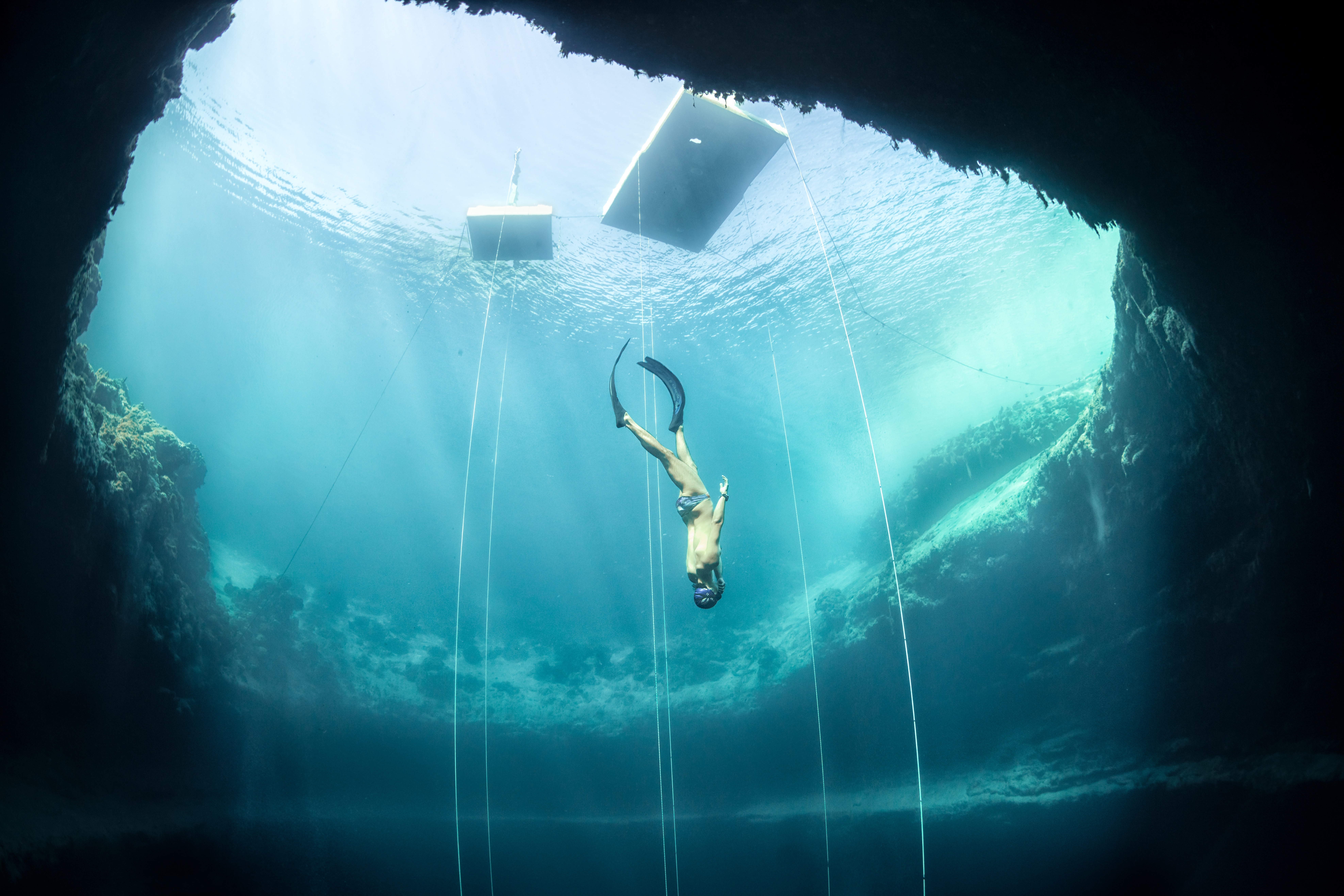 Freediving into a sea abyss over 200 metres deep